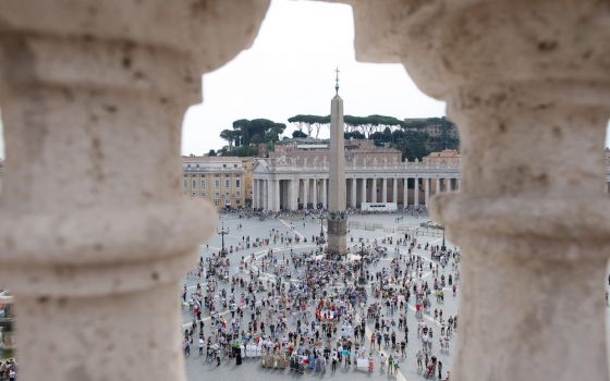 Pilgrims and visitors gather in St. Peter's Square at the Vatican to pray the Angelus with Pope Francis Sept. 20. (CNS/Vatican Media)