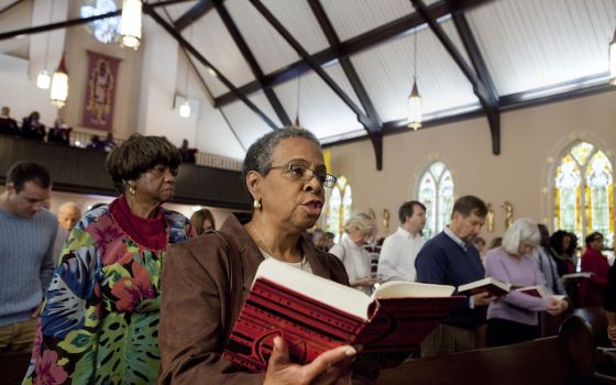 People sing during Mass at St. Joseph's Catholic Church in Alexandria, Virginia, in 2011. (CNS/Nancy Phelan Wiechec)