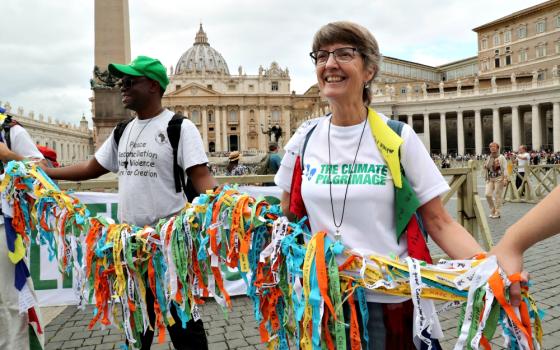 Pilgrims of Catholic environmental movements are seen Oct. 4, 2018, at the start of the climate walk in St. Peter's Square at the Vatican. (CNS/Reuters/Tony Gentile)