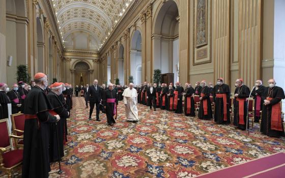 Pope Francis arrives for an audience for the annual exchange of Christmas greetings with members of the Roman Curia in the Apostolic Palace at the Vatican on Dec. 23, 2021. (RNS/Courtesy of Vatican Media)