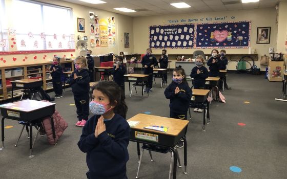 Distanced and masked students pray at St. Francis de Sales School in Las Vegas. (Courtesy of the Las Vegas Diocese)