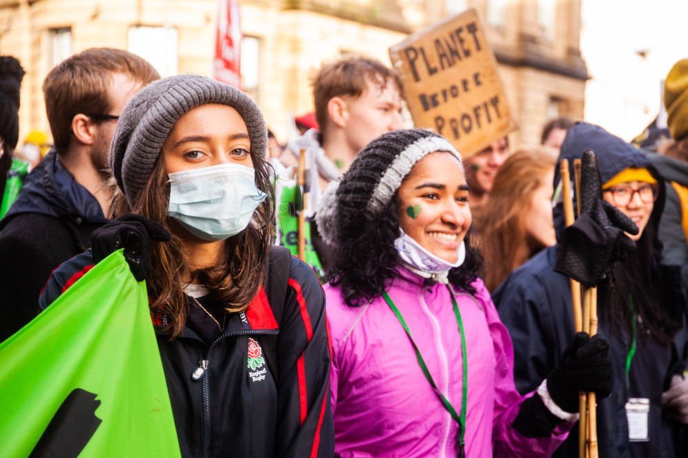 Young women from London join a protest during a Day of Action at the U.N. Climate Change Conference Nov. 6 in Glasgow, Scotland. (CNS/Courtesy of  CAFOD/Louise Norton)