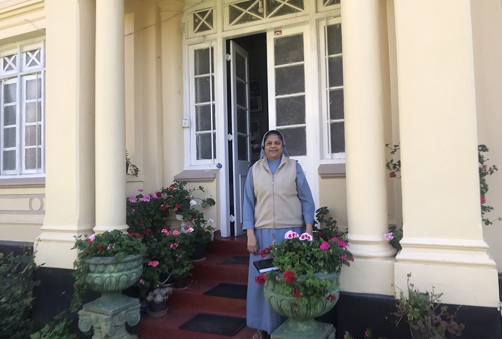 Sisters of Charity of Jesus and Mary Sr. Rupika Perera, who coordinates the prevention of human trafficking among tea plantation workers poses, in front of her Caritas convent at Nuwereliya. (Thomas Scaria)