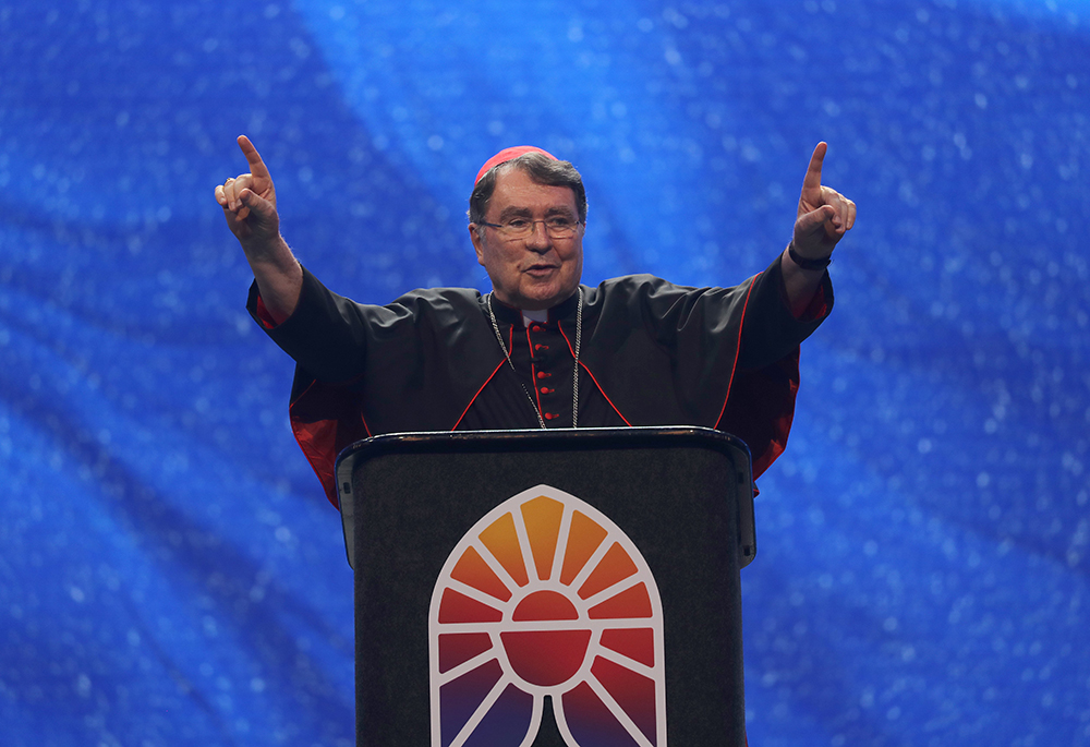 Cardinal Christophe Pierre, the Vatican nuncio to the United States, gestures as he speaks during the opening revival night of the National Eucharistic Congress, July 17 at Lucas Oil Stadium in Indianapolis. (OSV News/Bob Roller)