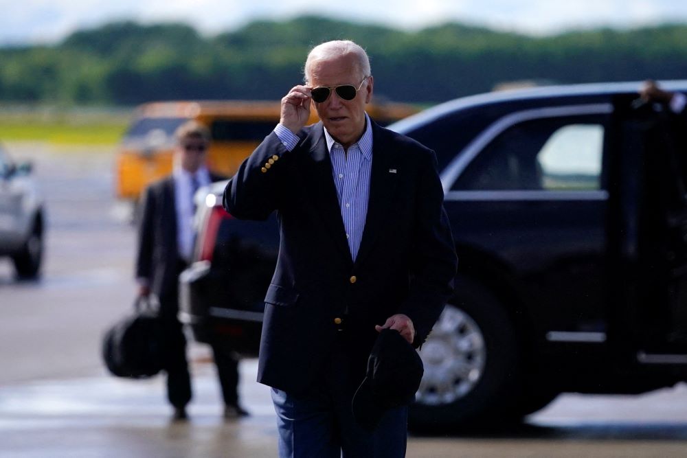 U.S. President Joe Biden walks at Dane County Regional Airport, in Madison, Wisconsin July 5.