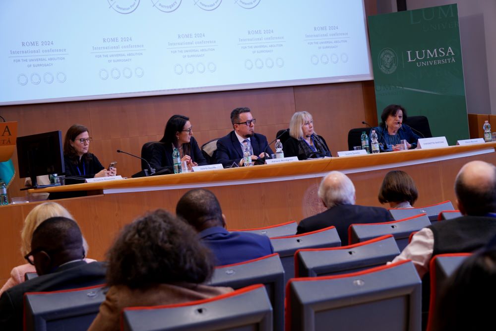 A panel of Italian lawmakers offers a presentation about Italy's current policies and new proposals to end "the trafficking of maternity" at an international conference in Rome April 5. The event was dedicated to the universal abolition of surrogacy. (CNS/Carol Glatz)