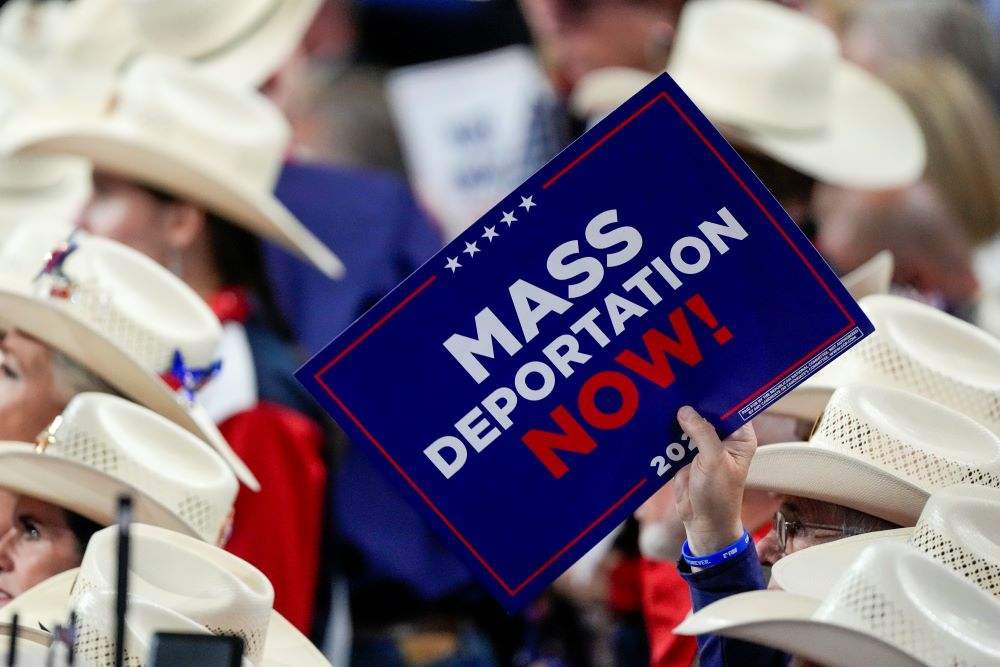 "Mass deportation now" sign at GOP convention