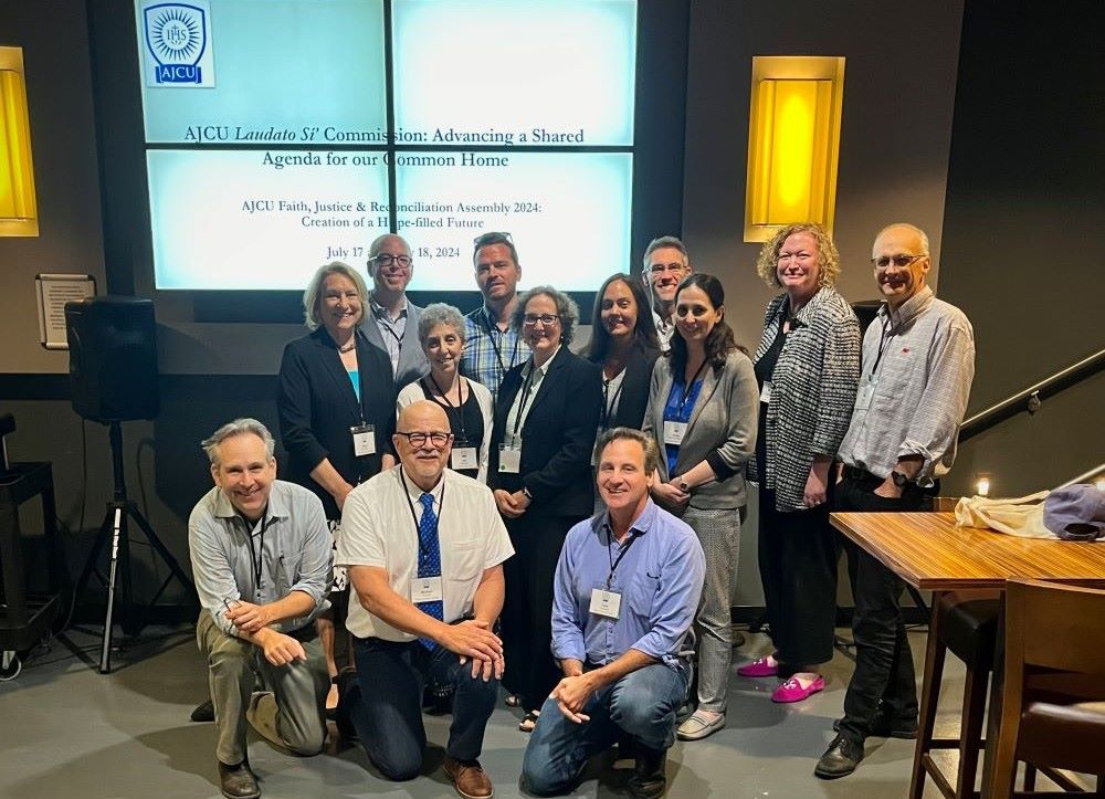 The Association of Jesuit Colleges and Universities Laudato Si' Commission poses during the AJCU Assembly in Chicago July 18. 