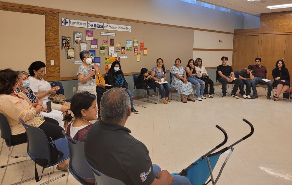 Sr. Martha de la Torre Juárez, co-director for leadership development of Strangers No Longer, leads a women's support circle in Ann Arbor, Michigan, in summer 2022. 