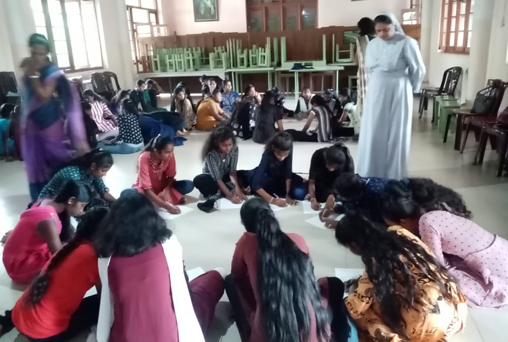 Students of a rural school in Nuwereliya pose with Sr. Rupika Perera of the Sisters of Charity of Jesus and Mary after a life-skills program. (Courtesy of Sr. Rupika Perera)