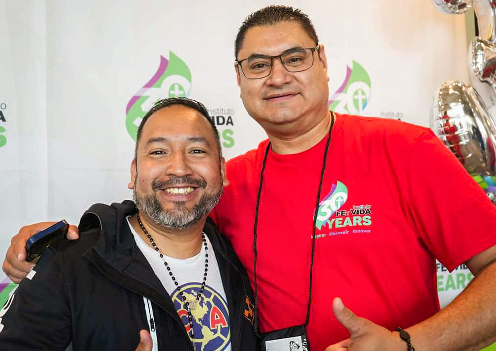 Oregon Catholics Alejandro Bautista and Ricardo Hernández are pictured June 23 at Instituto Fe y Vida's national Catholic leadership program for Hispanics, where Msgr. Lucio Adrián Ruiz, secretary of the Vatican's Dicastery for Communication, spoke to attendees. The two men said the Portland Archdiocese, without a clear explanation, recently turned down an offer from the institute to provide a free formation program to parishes in the archdiocese. (Courtesy of Alejandro Bautista)