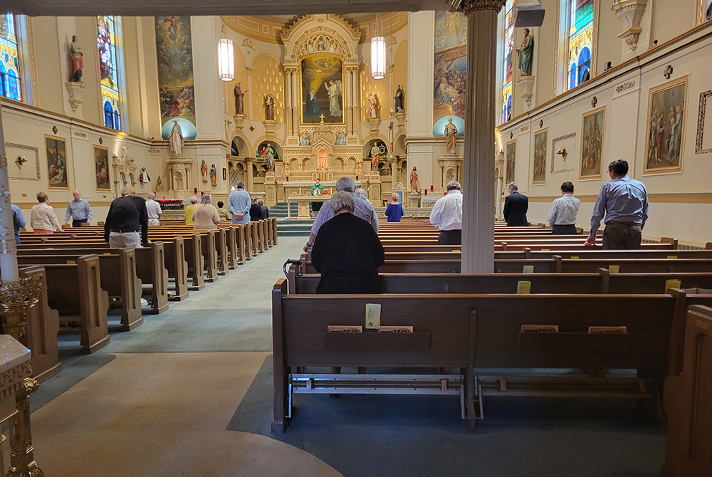 About 35 Mass-goers attend Wednesday's noon Mass at Old St. Mary's, about six blocks from the Fiserv Forum convention center where the Republican National Convention is being held July 15-18. (NCR photo/Heidi Schlumpf)