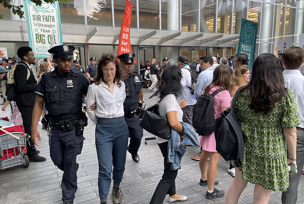 A demonstrator is arrested and dragged by the New York Police Department outside Citigroup’s headquarters on July 30 in New York. (NCR photo/Camillo Barone)