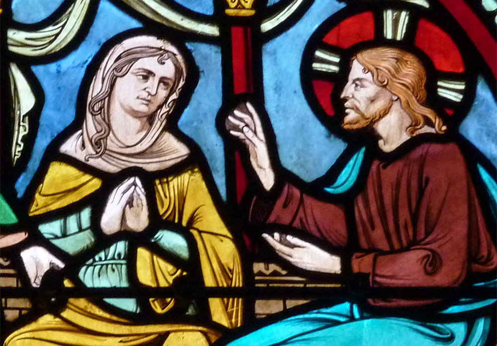 Mary of Bethany and Jesus are depicted in stained glass in Saint-Pierre de Neuilly Church in Neuilly-sur-Seine, France (Wikimedia Commons/Reinhardhauke)