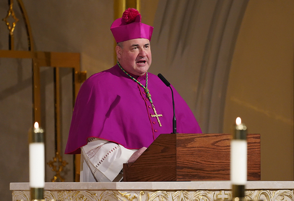 Then-Auxiliary Bishop Richard Henning of Rockville Centre, New York, speaks during Mass at St. Agnes Cathedral Jan. 1, 2021, in Rockville Centre, New York. On Aug. 5, the apostolic nunciature in Washington announced that Pope Francis had accepted Cardinal Sean O'Malley's resignation and appointed Henning to be Boston's 10th bishop and seventh archbishop. (CNS/Gregory A. Shemitz)
