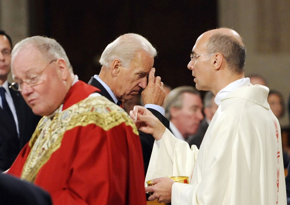 Biden receives Communion.