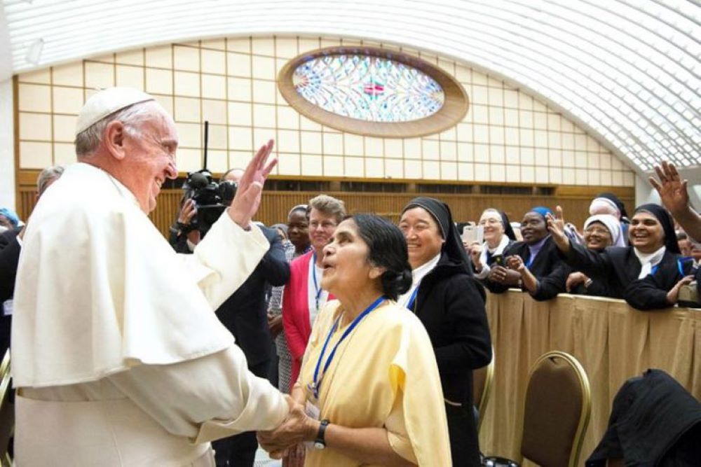 Pope Francis greets participants in a special audience with members of the International Union of Superiors General in the Paul VI hall at the Vatican May 12, 2016. 