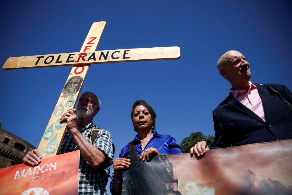 Survivors of clergy sexual abuse and activists march near the Vatican in Rome Sept. 27, 2023. 