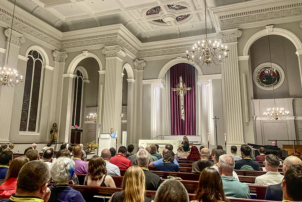 Catholic transgender woman Christina Zuba shares her story during evening prayer Aug. 2 at Holy Trinity Catholic Church in Washington, D.C., as part of the Outreach 2024 LGBTQ Catholic Ministry Conference. (NCR photo/Camillo Barone)