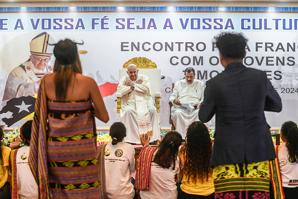 Pope Francis gestures during a meeting with young people at a convention center in Dili, Timor-Leste, Sept. 11. (CNS/Vatican Media)