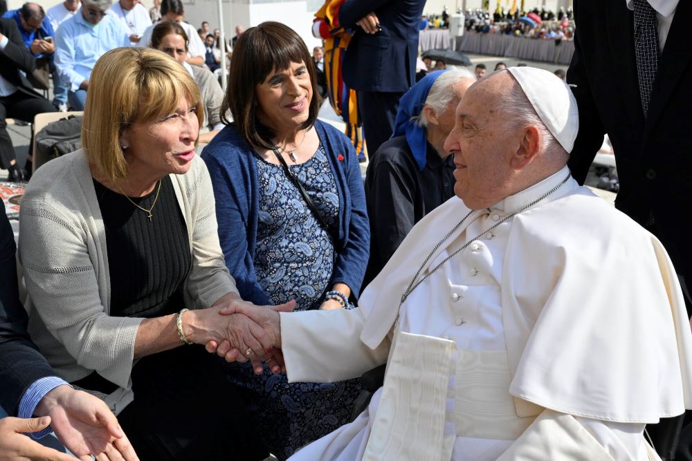 Maureen Rasmussen, left, and Martha Marvel meet Pope Francis in St. Peter’s Square at the Vatican on Sept. 18. 