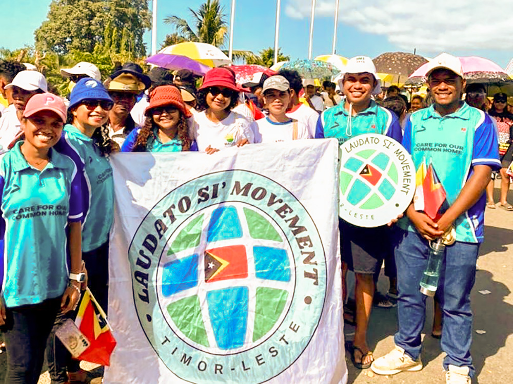 Members of the Laudato Si' Movement Timor-Leste Youth Organization attend a youth gathering with Pope Francis in the capital of Dili during his visit to the island nation Sept. 11. (Isaura Baptista Barros)