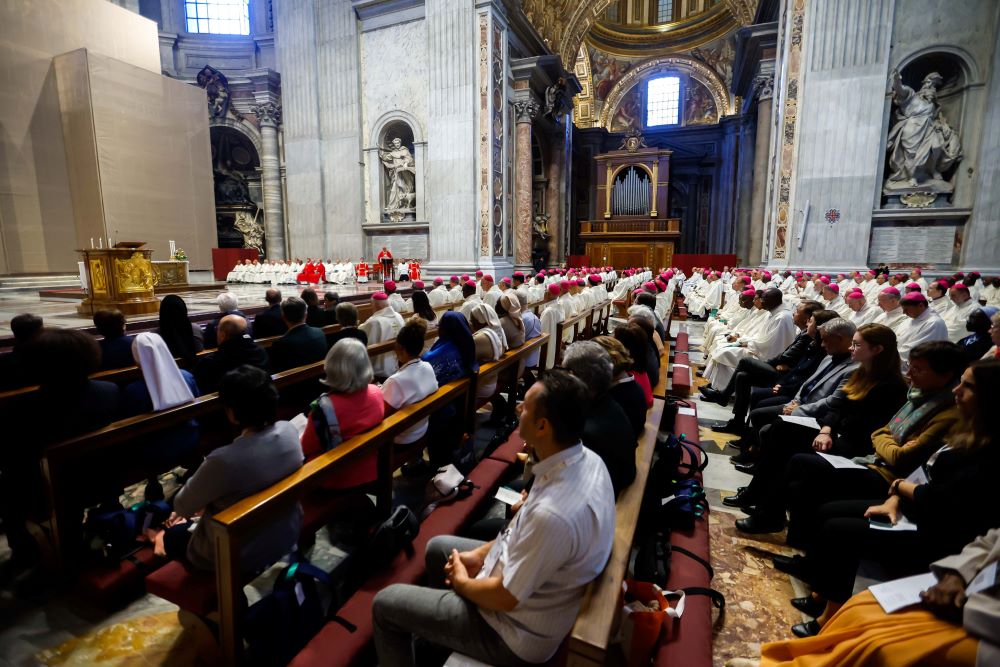 Cardinal Mario Grech, secretary-general of the synod, delivers his homily during Mass with synod participants at the Altar of the Chair in St. Peter’s Basilica at the Vatican, Oct. 21. 