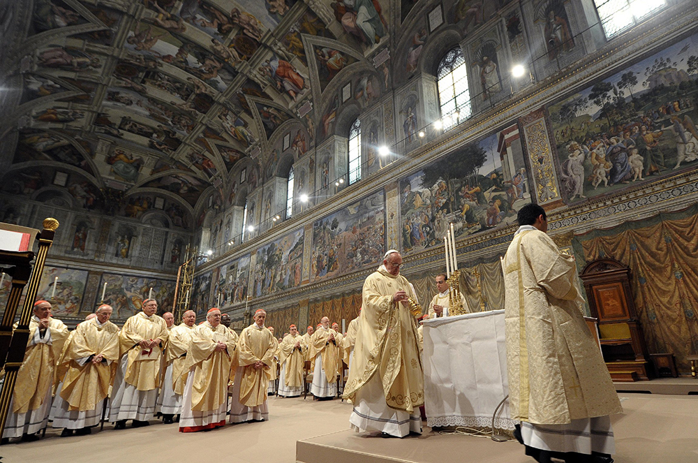 Pope Francis celebrates Mass with cardinal electors in the Sistine Chapel at the Vatican March 14, 2013, the day after his election. (CNS/L'Osservatore Romano) 