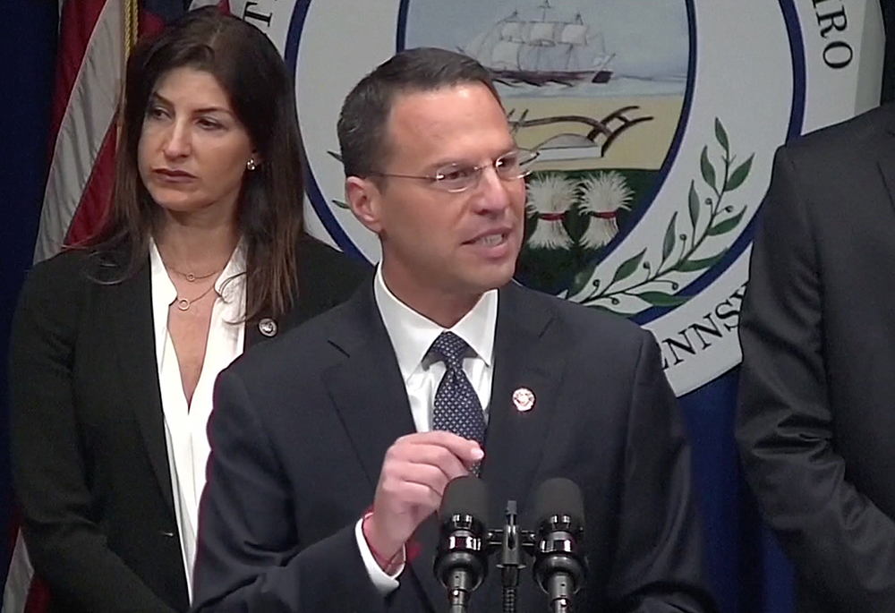 In a screen grab taken from video, then-Pennsylvania Attorney General Josh Shapiro speaks during an Aug. 14, 2018, news conference to release a grand jury on a months-long investigation into abuse claims spanning a 70-year period in the Dioceses of Harrisburg, Pittsburgh, Scranton, Allentown, Greensburg and Erie. (CNS/Reuters video)