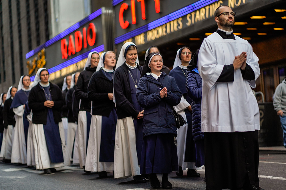 Religious sisters participate in a eucharistic procession through Midtown Manhattan in New York City Oct. 15. (OSV News/Gregory A. Shemitz)