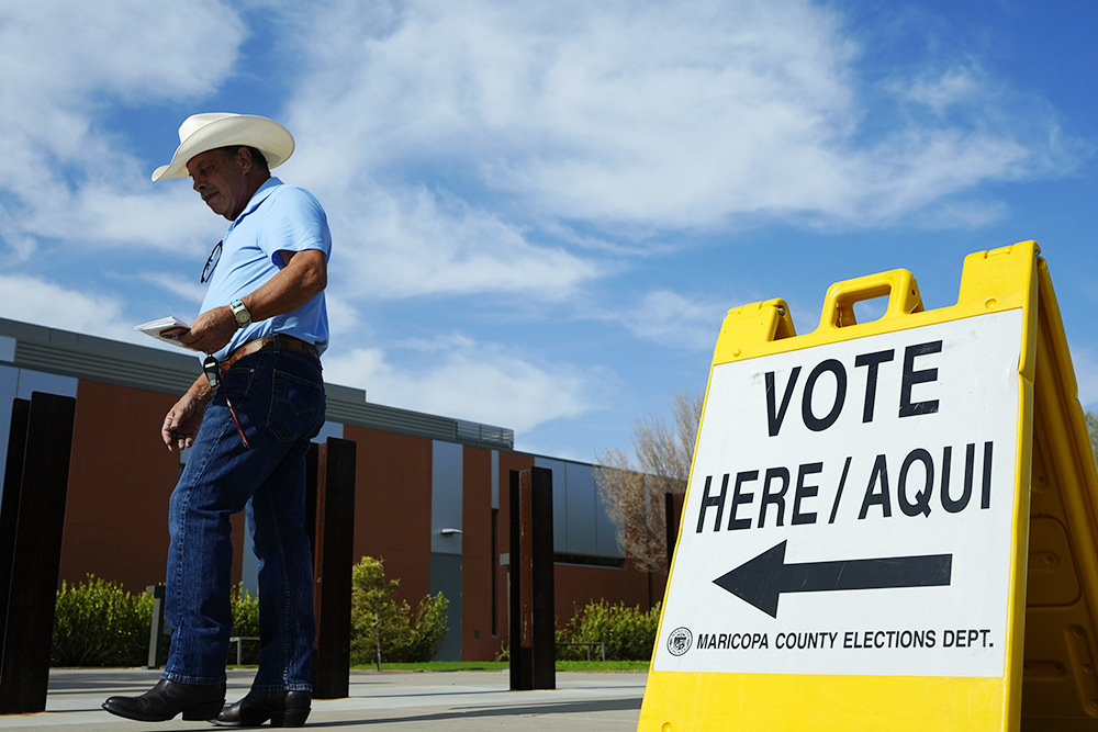 A voter walks to a voting precinct prior to casting his ballot in the state's primary election July 30, 2024, in El Mirage, Arizona. (AP file/Ross D. Franklin)