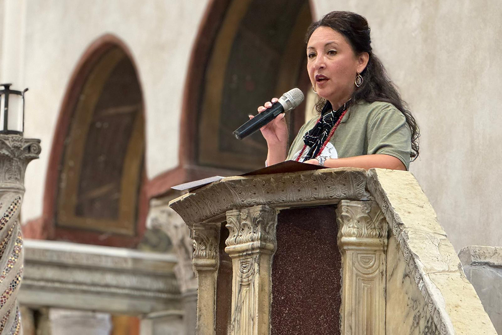 Jessica Morell, a U.S. military chaplain, offers a reflection Oct. 5, 2024, at the Basilica of Santa Maria in Cosmedin in Rome. Morell said the struggle for women and the diaconate has at times felt "abundant in hope, disappointment, rage, love, and connectedness," but she urged the group to continue. (NCR photo/Rhina Guidos)