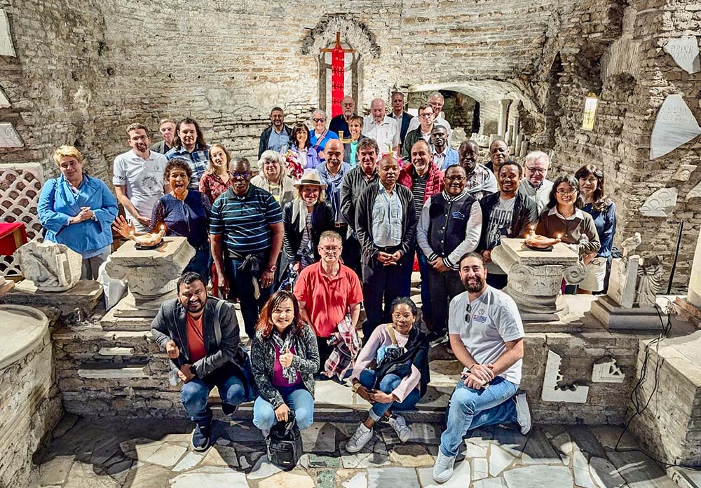 Attendees of the Lay Mission and Vocation Conference, representing more than 10 lay Catholic organizations, gathered at Domitilla Catacombs in Rome to renew the 1965 "Pact of the Catacombs" to highlight a "preferential option for the poor," a principle that has guided their collective and individual actions for decades. (Courtesy of Nate Tinner-Williams)