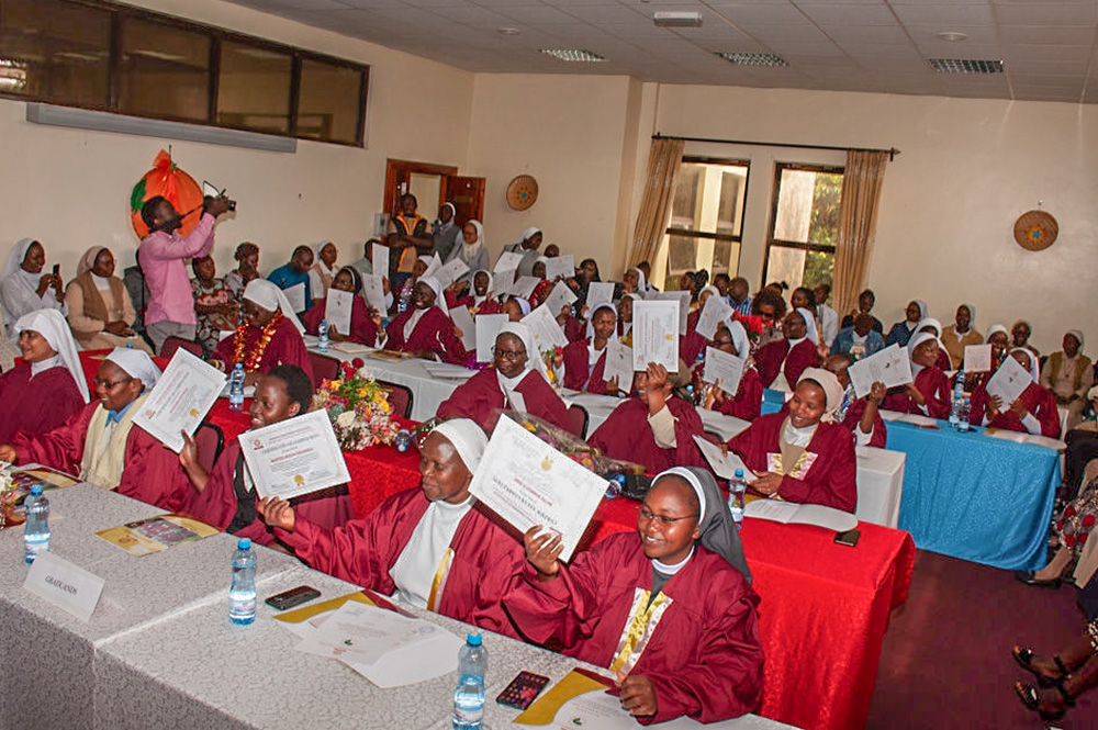 Graduates of the Hilton-Hekima Sisters Scholars Program toss their certificates in celebration after the May 2024 graduation. (Courtesy of Religious Sisters Communicators' Foundation Uganda)