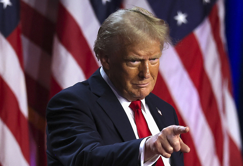 Republican President-elect Donald Trump gestures while addressing supporters during his rally at the Palm Beach County Convention Center Nov. 6 in West Palm Beach, Florida, after being elected the 47th president of the United States. (OSV News/Reuters/Carlos Barria)