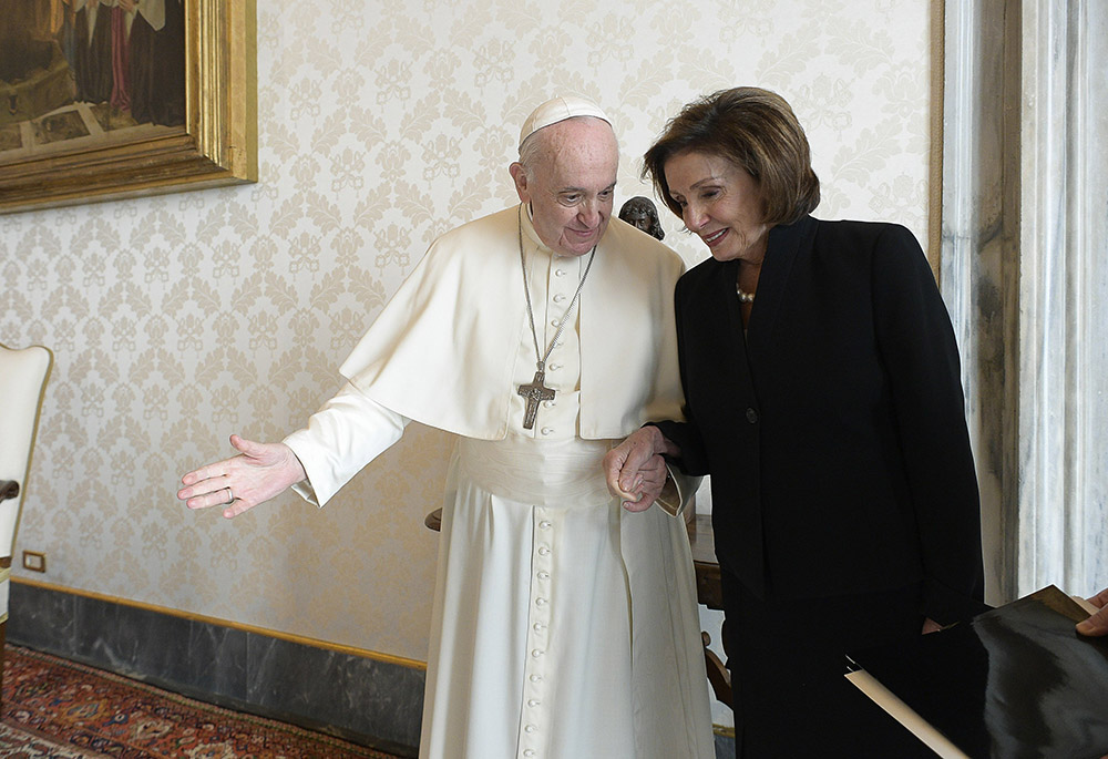 Pope Francis greets then-U.S. House Speaker Nancy Pelosi, D-Calif., during a private audience Oct. 9, 2021, at the Vatican. (CNS/Vatican Media)