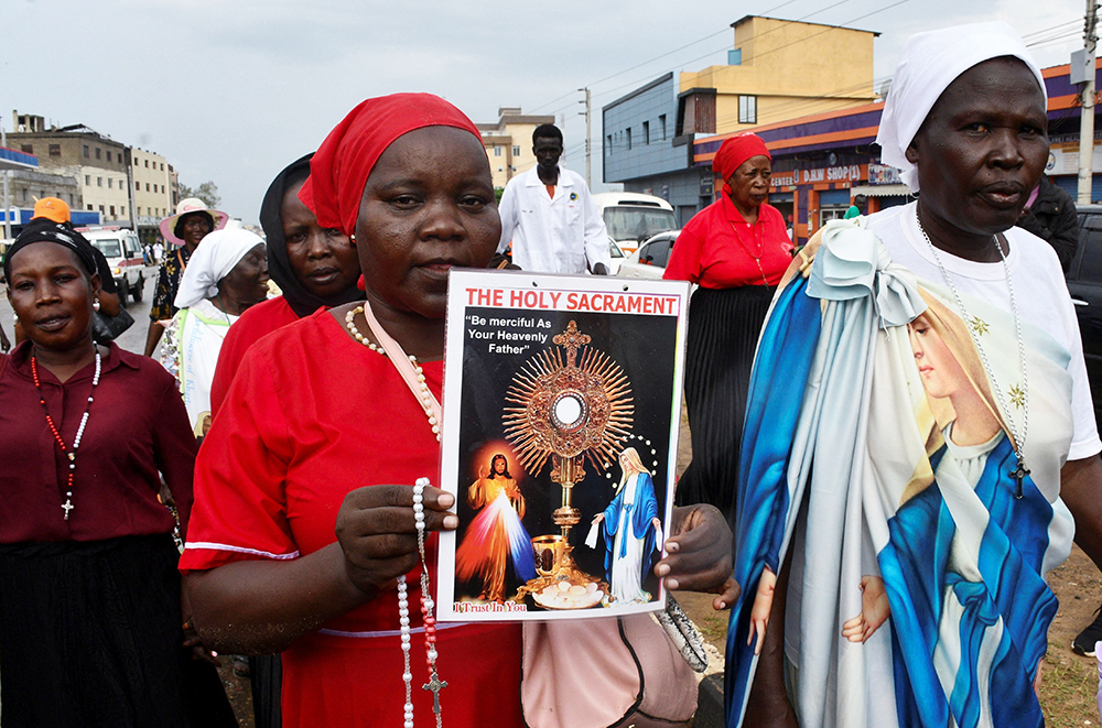 Catholics attend a procession during the National Eucharistic Congress in Juba, South Sudan, Nov. 22, 2024, following a night of gunfire after security forces moved to arrest the former head of the intelligence service. (OSV News/Reuters/Samir Bol)