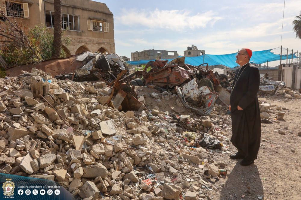 Cardinal Pierbattista Pizzaballa, Latin patriarch of Jerusalem, looks at the destruction on the streets of Gaza City Dec. 22, 2024. He made a pre-Christmas visit aiming to bring the joy of the season to the suffering Christian community in the Gaza Strip in the 14th month of Israel-Hamas war. (OSV News photo/courtesy Latin Patriarchate of Jerusalem)