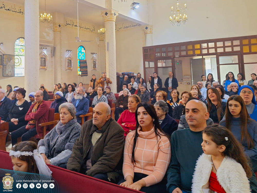 Faithful are seen in the Holy Family Parish's church in Gaza City Dec. 22, 2024. Cardinal Pierbattista Pizzaballa, Latin patriarch of Jerusalem, made the pre-Christmas visit aiming to bring the joy of the season to the suffering Christian community in the 14th month of Israel-Hamas war. (OSV News photo/courtesy Latin Patriarchate of Jerusalem)