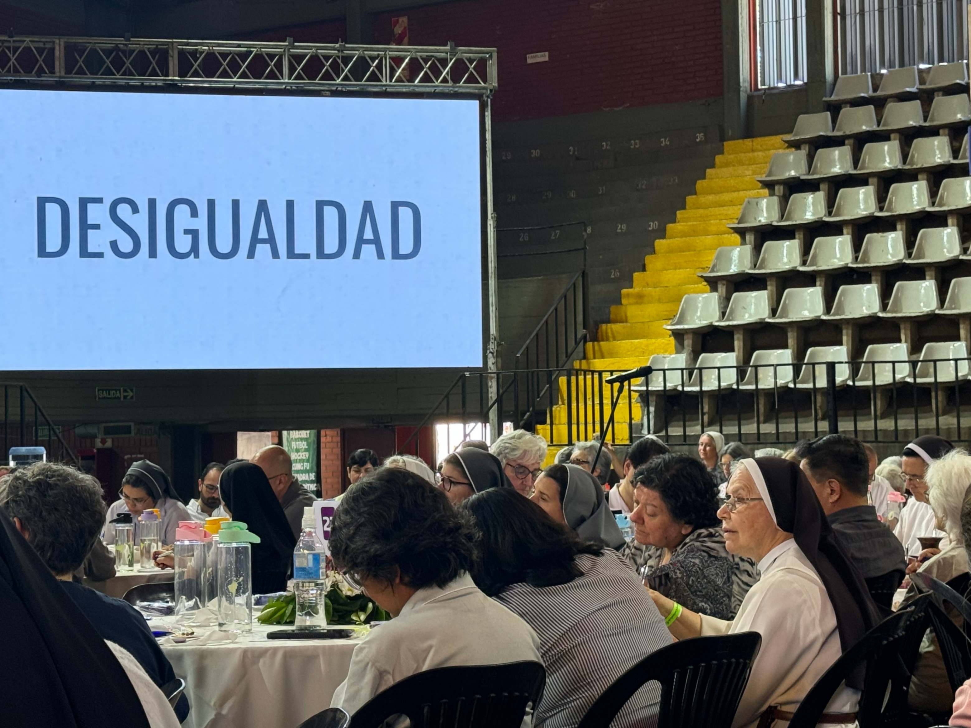 Attendees of the V Latin American and Caribbean Congress on Religious Life listen to a presentation Nov. 22, 2024, in Córdoba, Argentina, about the growing inequality of Latin America. Some 400 religious men and women from more than 20 countries participated in person and 600 more by Zoom, said members of the Confederation of Latin American and Caribbean Religious, which organized the gathering. (GSR photo/Rhina Guidos)