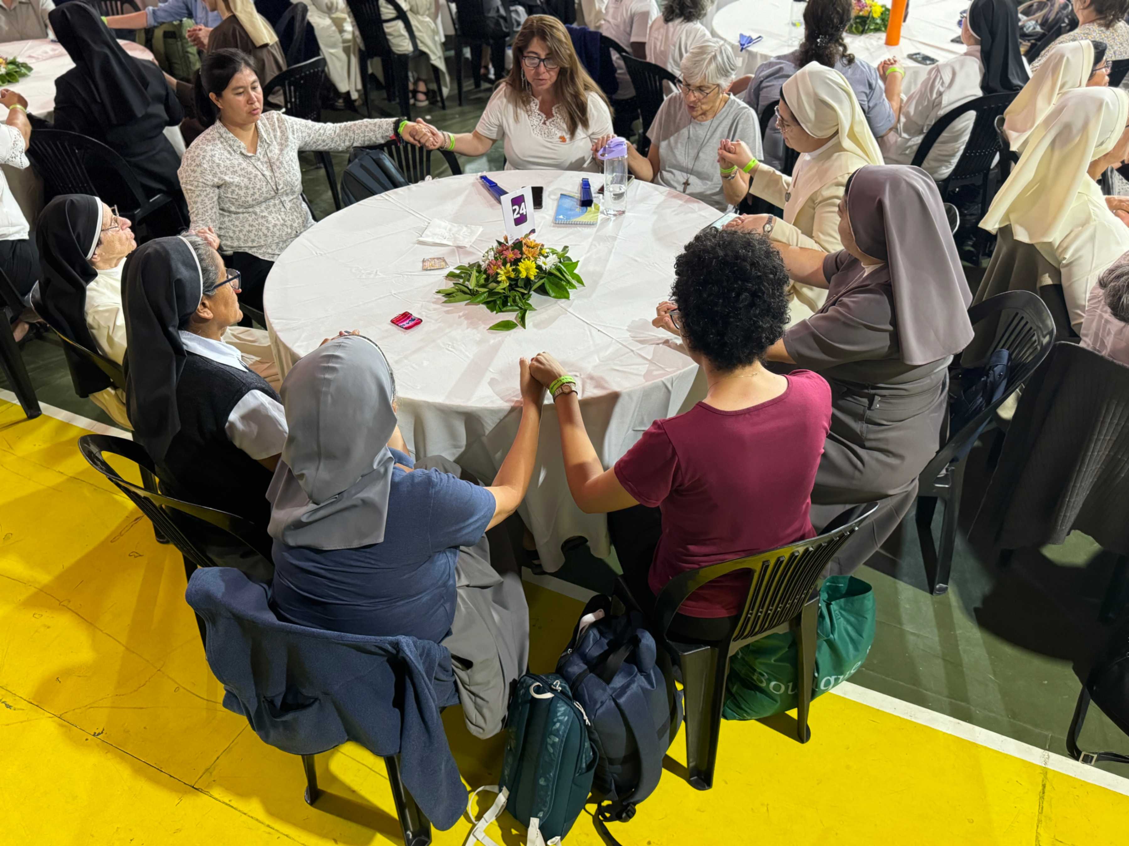 A group of women and men religious pray in Córdoba, Argentina, during the opening Mass of the V Latin American and Caribbean Congress on Religious Life, organized by CLAR Nov. 22-24, 2024, in Córdoba, Argentina. (GSR photo/Rhina Guidos)