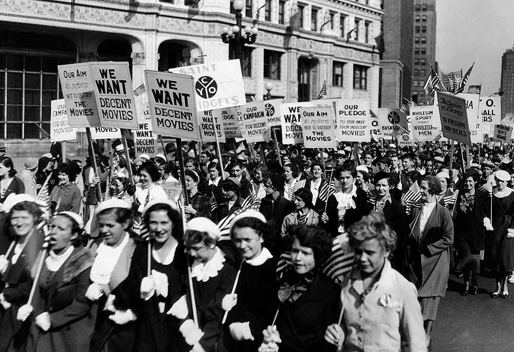 Some 50,000 members of the National Legion of Decency, including parochial school students, parade down Michigan Avenue in Chicago on Sept. 27, 1934, to demand "decent movies." (Shutterstock/Everett Collection)