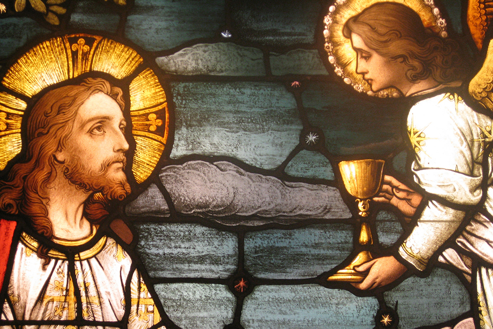 Jesus is depicted in the Garden of Gethsemane in this stained-glass image from the Cathedral of Our Lady of the Angels in Los Angeles. (CNS/The Tidings/Mike Nelson) 