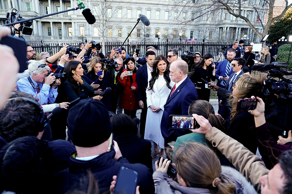 U.S. Department of Homeland Security Secretary Kristi Noem and Tom Homan, appointed as "border czar," speak with the media in Washington, Jan. 29, 2025. (Reuters/Ken Cedeno)