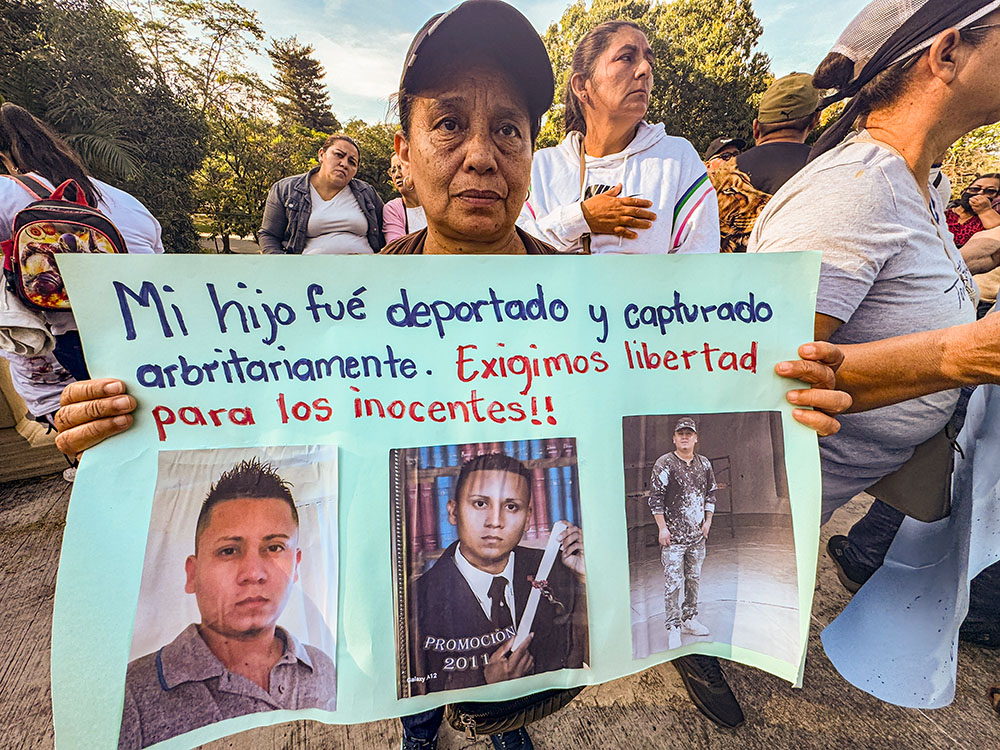 During a Jan. 12, 2025, protest in San Salvador, El Salvador, Albertina Jovel Escobar holds a sign showing her son who was deported and sent to prison as soon as he landed in his home country. A group of Catholic mothers like Jovel warned that those deported to El Salvador could be sent straight to prison without due process, as the U.S. is in talks with the Salvadoran government about taking in deported migrants from different countries. (NCR photo/Rhina Guidos)