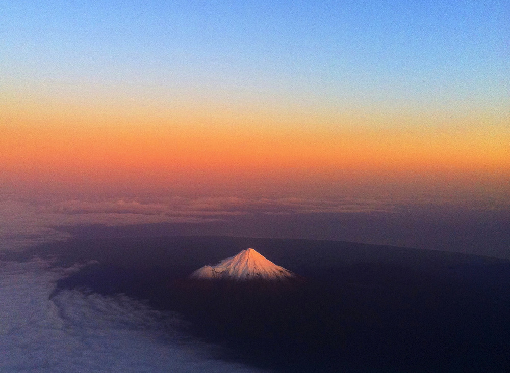 Aerial view of mountain in sunset.