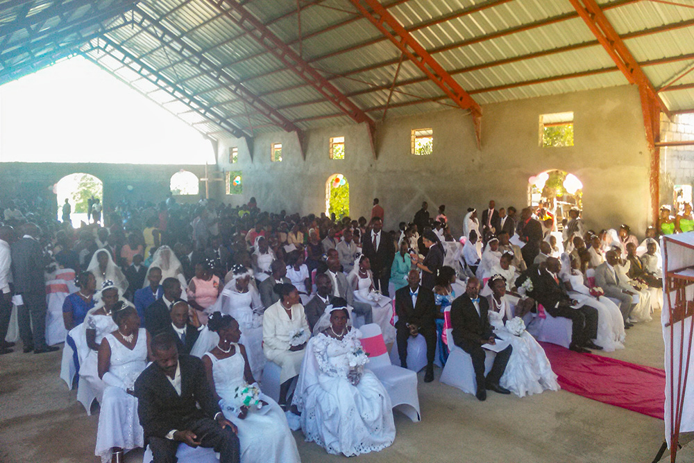 A wedding can be expensive in Haiti, so couples live together and have families without the sacrament of marriage. However, members of Our Lady of the Assumption Parish wanted to be married within the church. As a result, St. Margaret Mary and the Haitian community developed a marriage program that included marriage preparation classes for all couples, especially those who had been together for years, as well as a 2021 communal ceremony. St. Margaret Mary parishioners contributed funds