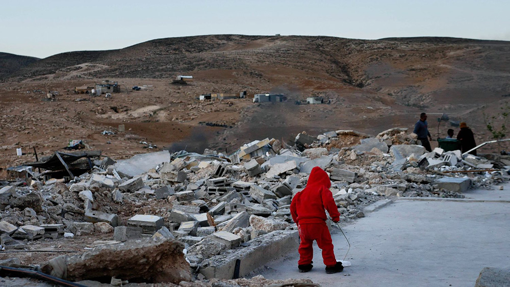 In "No Other Land," Palestinian activist and co-director Basel Adra chronicles the destruction of a Palestinian village in Masafer Yatta, a community struggling to survive and fighting for its basic rights in the Israeli-occupied West Bank. (Dogwoof)