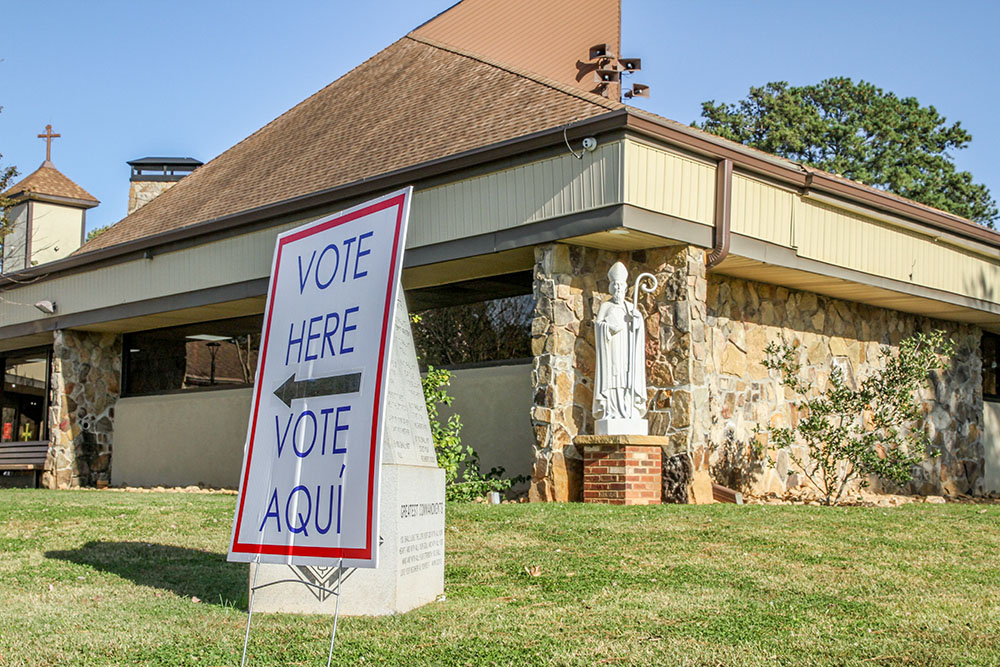 A bilingual voting sign is seen at St. Patrick Church polling station in Norcross, Ga., on Election Day 2020. (OSV News/The Georgia Bulletin/Michael Alexander)