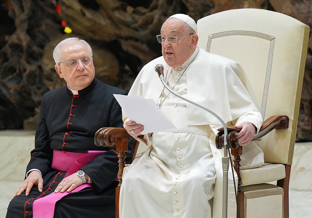 Pope Francis speaks to visitors in Spanish during his general audience in the Paul VI Audience Hall Feb. 12 at the Vatican. (CNS/Lola Gomez)